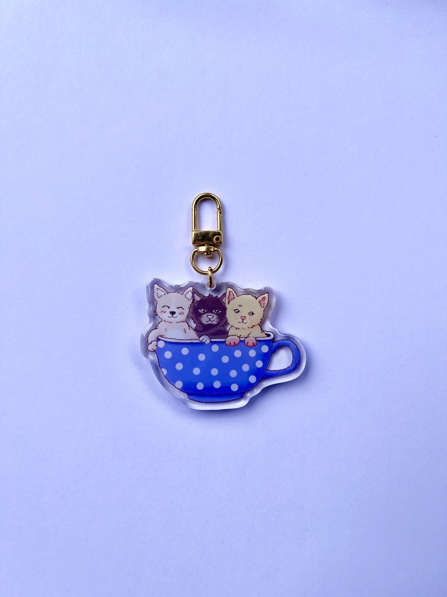 THREE KITTIES IN A TEA CUP
