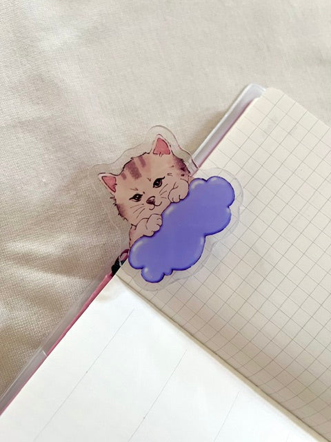 a brown cat over purple cloud paper clip by simple and soft