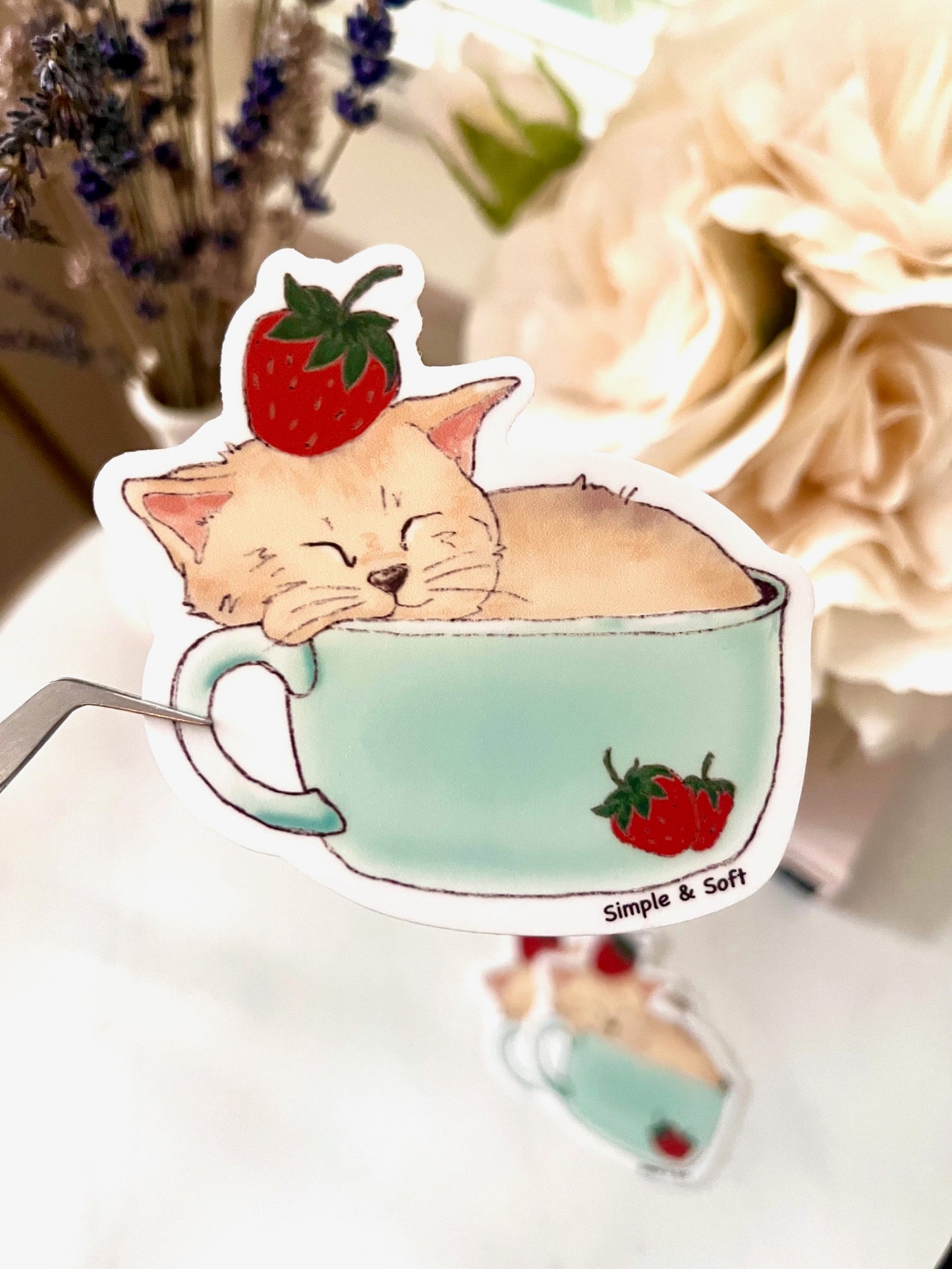 SLEEPY CAT IN THE STRAWBERRY CUP